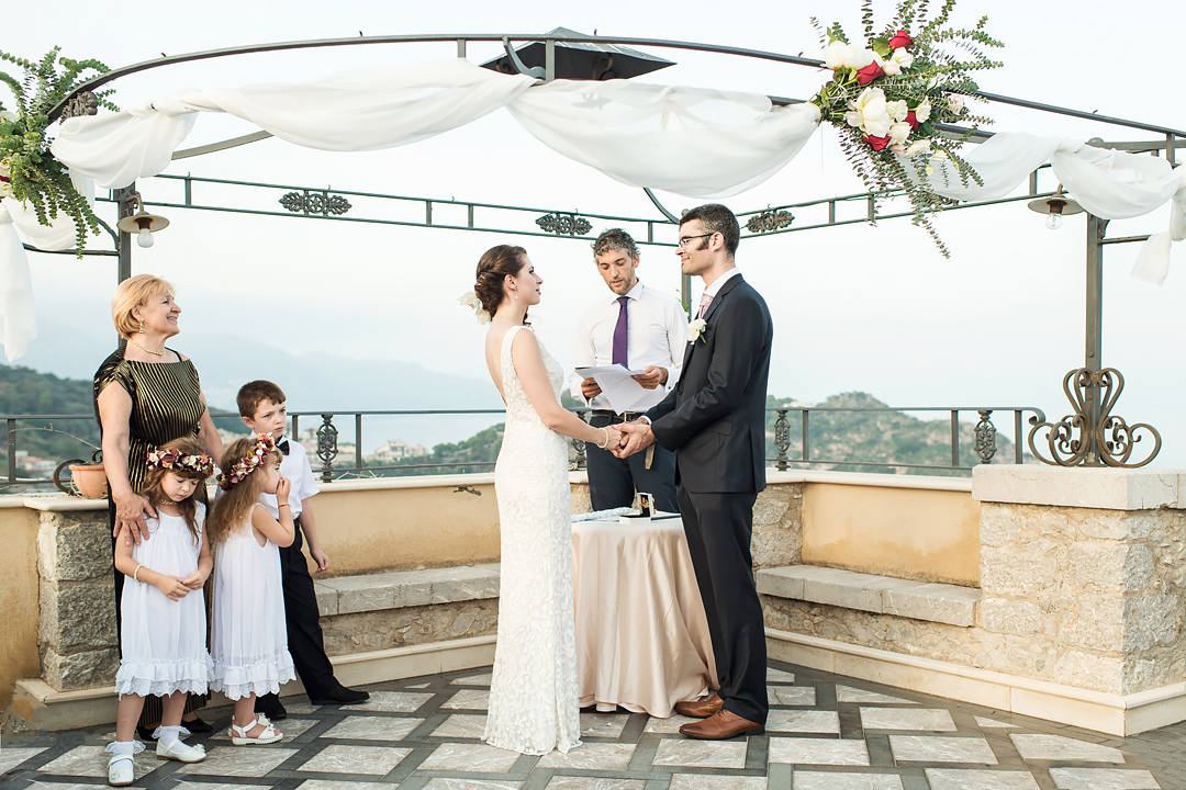 wedding ceremony on terrace over sea
